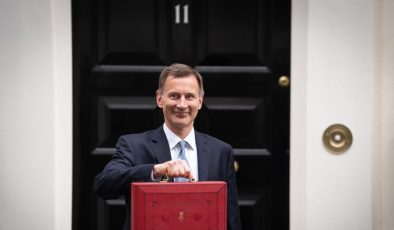 Budget leaves household incomes stagnant and people paying more taxes despite public service cuts, Resolution Foundation says