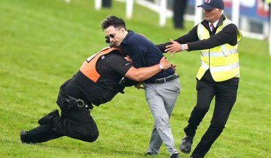 Nineteen arrested over plans to disrupt Epsom Derby – as protester runs on to racecourse