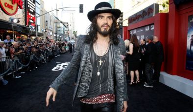 Russell Brand ‘ripped holes in woman’s tights’ and ‘refused to call her taxi until she performed sex act’