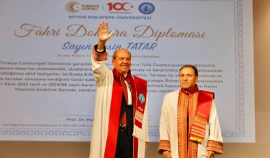 Tatar’a “Kıbrıs Türk’tür Türk kalacak” sloganları eşliğinde fahri doktora takdimi