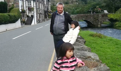 Father was taken to hospital by police weeks before being found dead with daughters and woman