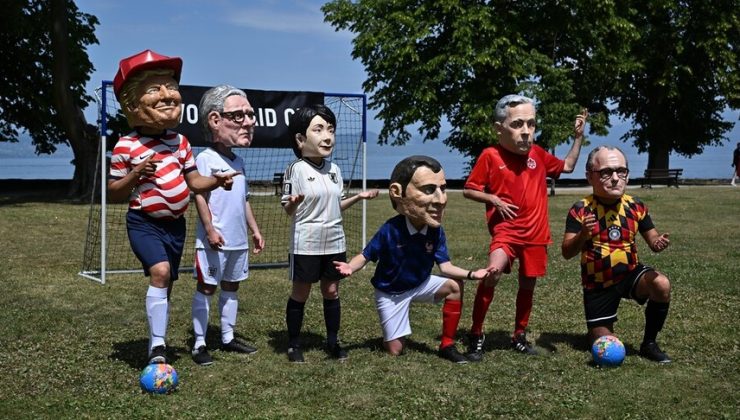 Oxfam aktivistleri G7 Liderler Zirvesinde protesto gösterisi düzenledi