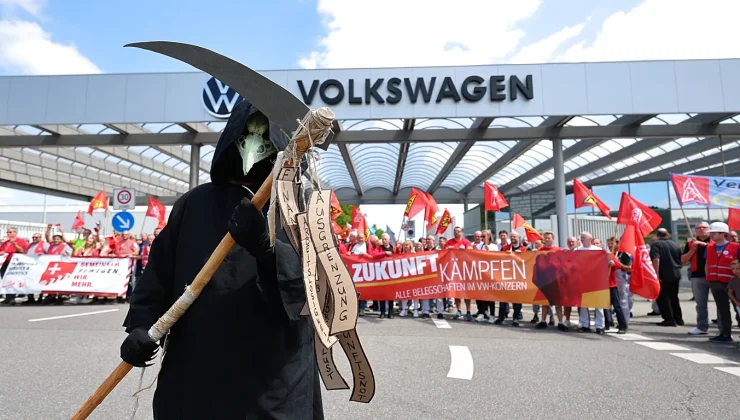 Volkswagen unveils four-year plan as questions remain over jobs and plants